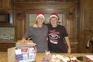 henrik-and-mitch-in-santa-hats-with-german-chocolate