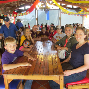 Lee - family at table in Colombia